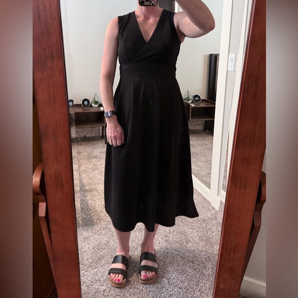 Black Sleeveless Midi Dress. Pull on style with stretchy fabric. M (8/10). NWOT